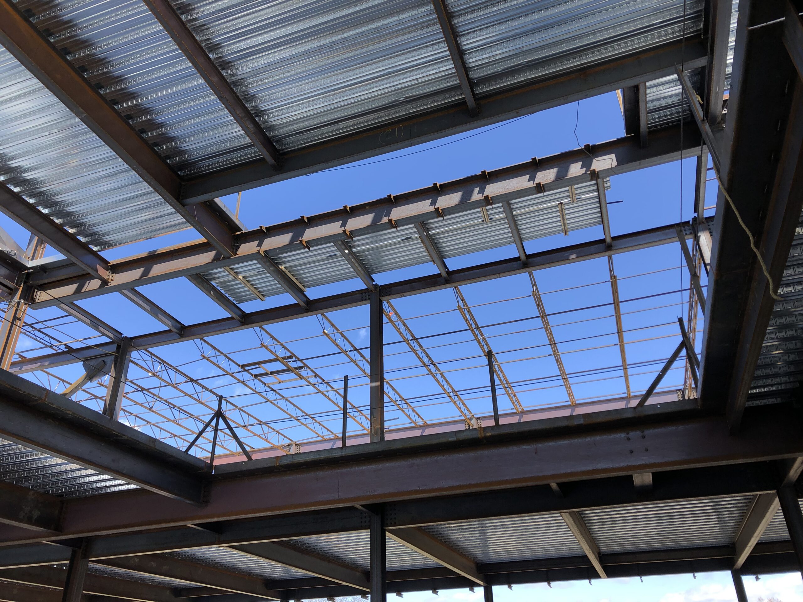 Large metal structure with a blue sky in the background